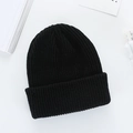 Classic black ribbed knit beanie for winter, warm cuffed solid color skull cap for adults - Black