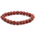 Macro shot of 8mm red volcanic lava stone beads showing natural porous texture - Khaki