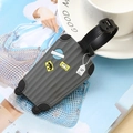 Gray silicone luggage tag in suitcase shape with colorful travel icons and black strap - Gray