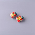 Christmas hair clips set featuring red resin gift box charms with green ribbon wrap - Gift