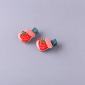 Pair of kids red glove Christmas hair clips with Merry Christmas text and green ribbons - Christmas Sock