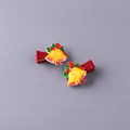 Set of 2 Christmas hair clips featuring yellow bells, red bows and green holly leaves - Bell