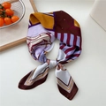 Burgundy and lavender equestrian print satin scarf tied in a stylish bowtie knot - Brown Horse Check Border