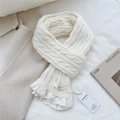 Detail view of cream knit scarf featuring cable stitch pattern and delicate white lace trim - 9*155cm / Cream
