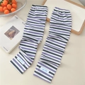 Detail of striped knitted sun protection sleeves with purple and grey bands and cuff logo - One Size / Three-tone Purple