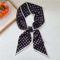 Elegant black and white paisley and polka dot silk scarf tied in a stylish bow - Black Paisley Polka Dot
