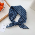 Vintage blue polka dot cotton silk scarf tied in a bow with floral geometric patterns - Grid Floral Navy