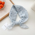 Light blue polka dot hair scarf with a vintage bow tie design and delicate brand tag - Gradient Polka Dot Blue