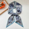 Elegant navy and light blue paisley silk scarf twilly tied in a stylish knot on white surface - Tree Pattern Blue
