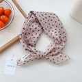 Chic pink silk-feel scarf with black polka dots, styled as a lightweight hair band wrap - Pebble Pattern Green