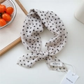Polka dot white silk scarf for women tied as a hair accessory with minimalist branding - Pebble Pattern Beige