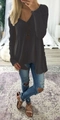 Detail of dark grey V-neck waffle knit sweater with asymmetrical hem and loose fit - S / Tops / Black