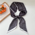 Black and white paisley pattern long silk scarf styled in a soft knot for styling - Flower Paisley Black