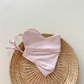 Close-up of pink breathable sun mask with adjustable ear loops and nose vent mesh - Pink