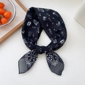 Elegant black silk square scarf featuring white musical instrument prints on a white desk - 67x67cm / 14D Music Geometry Black
