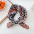 Floral patchwork silk scarf in brick red and green bohemian pattern tied in a knot - Cotton Rich Flower Strip Orange