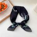 Black floral square silk scarf with white lily of the valley print tied in a bow - Style 18D Green Leaf Pearl Flower Black