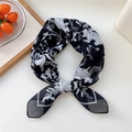 Elegant black and white floral pattern square silk scarf in a stylish knotted arrangement - 67x67cm / 24D Floral Print Black
