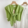 Detail of grass green knitted shawl with bow tie design and delicate knit texture - 42*94cm / Grass Green