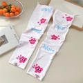 Detail of sun protection cooling sleeves with cute floral patterns and elastic drawstring - WOW Pink (04 Pink Label)