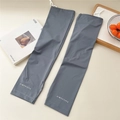 Detail of dark gray sun protection sleeves with adjustable drawstring and logo - One Size / Medium Grey