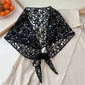 Macro shot of black floral lace triangle shawl draped over a white blouse detail - Five-Leaf / Black