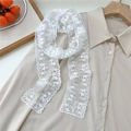 Detailed view of white floral lace scarf with embroidery letters on beige shirt - Flat Edge Lace / 130cmx6cm / Star Flower White