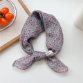 Blue floral cotton-linen feel scarf with pink flowers and a woven brand label - Blue Ground Small Grass Flower
