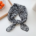Elegant white paisley cotton scarf with black crochet lace trim and knotted detail - White Paisley