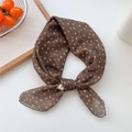 Brown floral cotton-linen scarf tied in a bow with delicate white flowers and black hem - Brown Ground Fine Green Leaf
