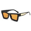 Retro thick black cat-eye sunglasses with orange lenses and gold metal accents - Black Frame Orange Lens