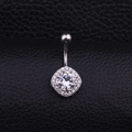 Polished silver navel ring with square zircon pendant on black leather background - Square Halo Style (Style H)