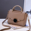 Chic taupe crossbody bag with gold metal handle and pebble leather texture for women - Light Yellow