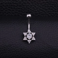 Macro shot of silver stainless steel navel ring with hexagram pendant and cubic zirconia - Hexagram Style (Style F)