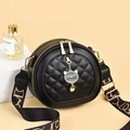 Minimalist black round crossbody bag with diamond stitching and cat pendant - Black