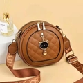 Minimalist caramel brown quilted crossbody bag with cat pendant and wide jacquard strap - Caramel color