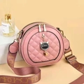 Detail of pink round crossbody bag with cute cat metal charm and wide patterned strap - Pink