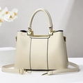 Elegant beige pebbled leather handbag with gold hardware and adjustable shoulder strap - Off-white