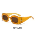 Gafas de sol Y2K onduladas con montura ámbar y lentes de color té coordinados - Montura Té Lente Té