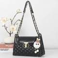 Chic black quilted crossbody bag with gold T-lock and chain strap for women - Black