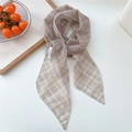 Plaid elastic mesh scarf in beige and light blue, shown on a bright white surface - Khaki Mixed Plaid