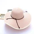Pink wide-brimmed sun straw hat with dark brown woven ribbon bow for summer beach vacation - Nude Pink