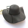 Women's black wide brim straw sun hat with decorative ribbon for beach vacations - Black