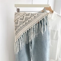 Detail of cream crochet lace waist scarf with long fringe layered over blue jeans - Style 2 Long Fringe Striped Fan
