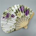 Detail of white bamboo folding fan with purple floral pattern and natural wood ribs - No.2 Brilliant Purple
