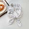 White silk neck scarf with black dotted pattern in a stylish knotted arrangement - 19SR-Dotted Grid Cream