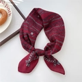 Elegant wine red square scarf with silver chain patterns tied in a stylish bow - 26SR-Silver Chain Red