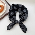 Classic black paisley bandana with white floral pattern tied in a decorative knot - 33SR-Bubble Floral Black