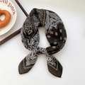 Elegant dark brown paisley satin silk scarf tied in a neat square knot over white background - 36SR-Paisley Lotus Grid Chestnut