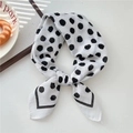 Elegant white silk scarf with black polka dots and border displayed in a knotted style - Irregular Spotted Milk White (28SR)